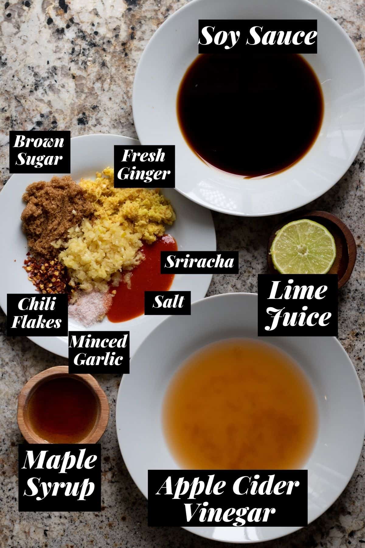 Sauce ingredients measured out into bowls.