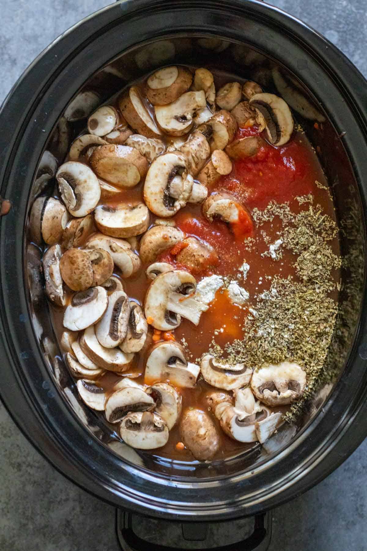 Soup ingredients mixed into the crockpot before cooking.