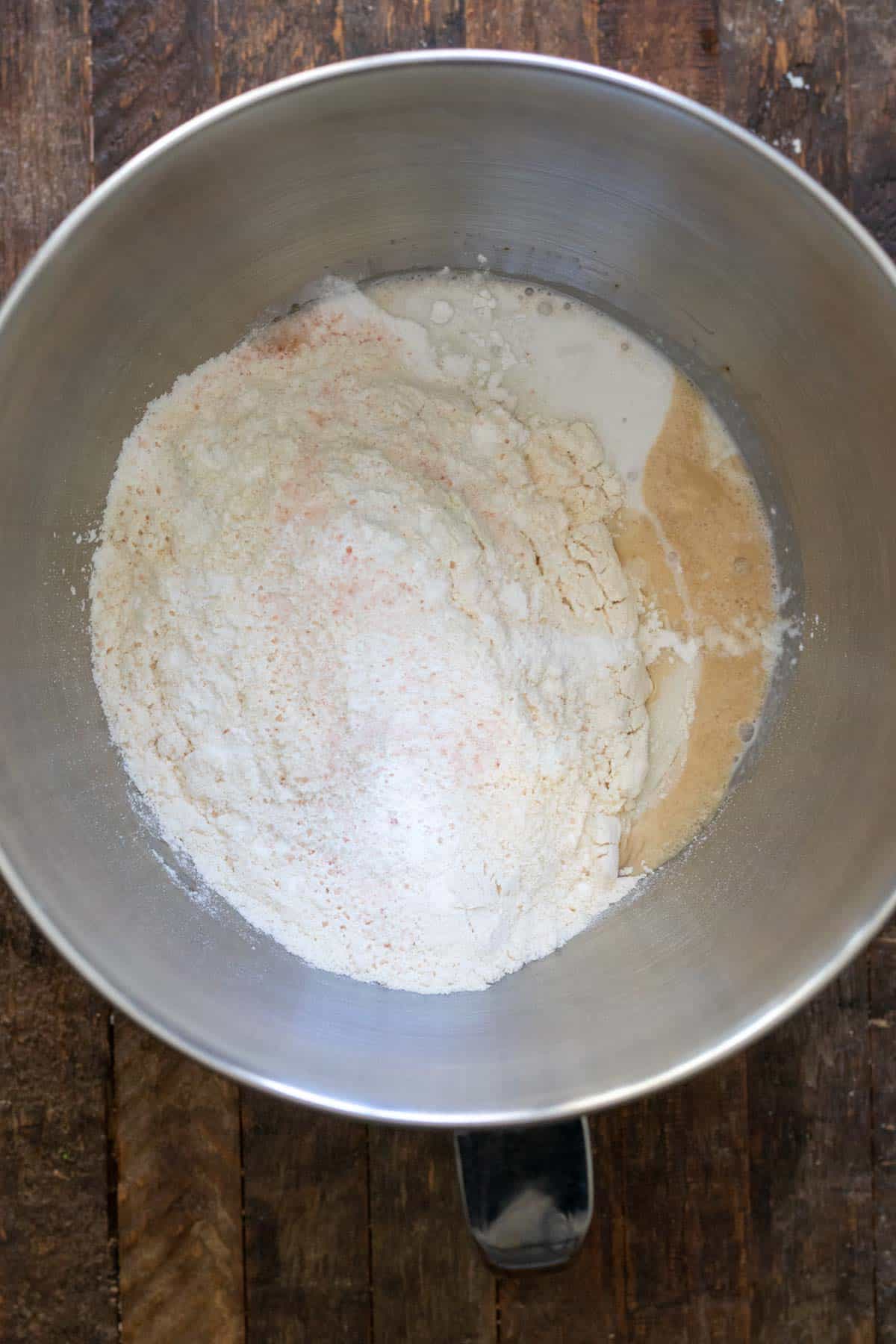 Flour, salt and coconut milk added to bloomed yeast mixture.