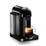 Nespresso machine with coffee cup.