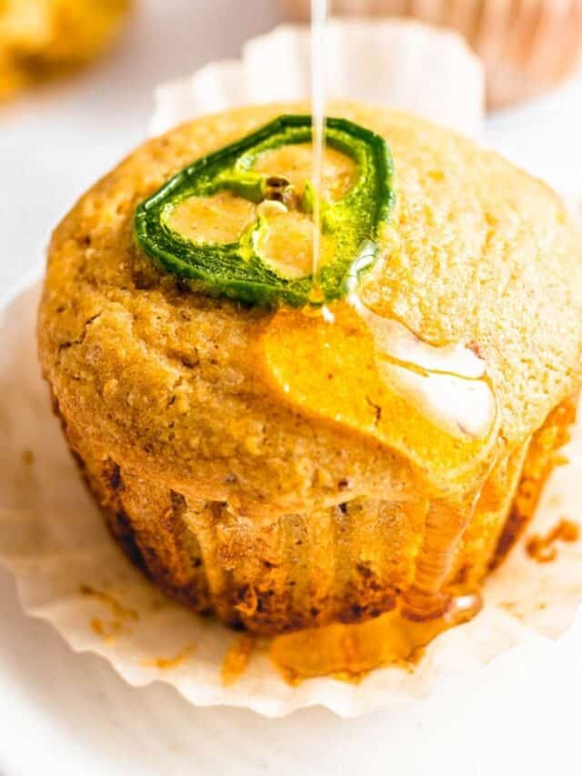 Cornbread muffin with sliced jalapeno pressed in top, drizzled with sweet agave.