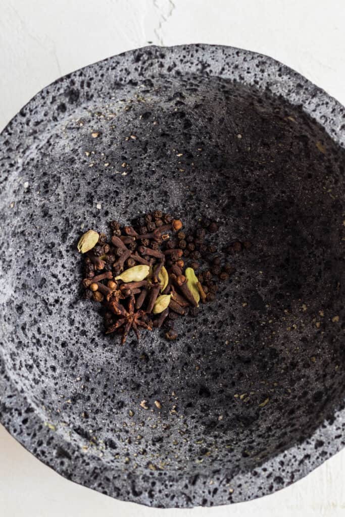 Spices in a mortar and pestle.