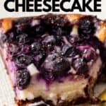 Baked vegan cheesecake with blueberries and graphic text overlay.