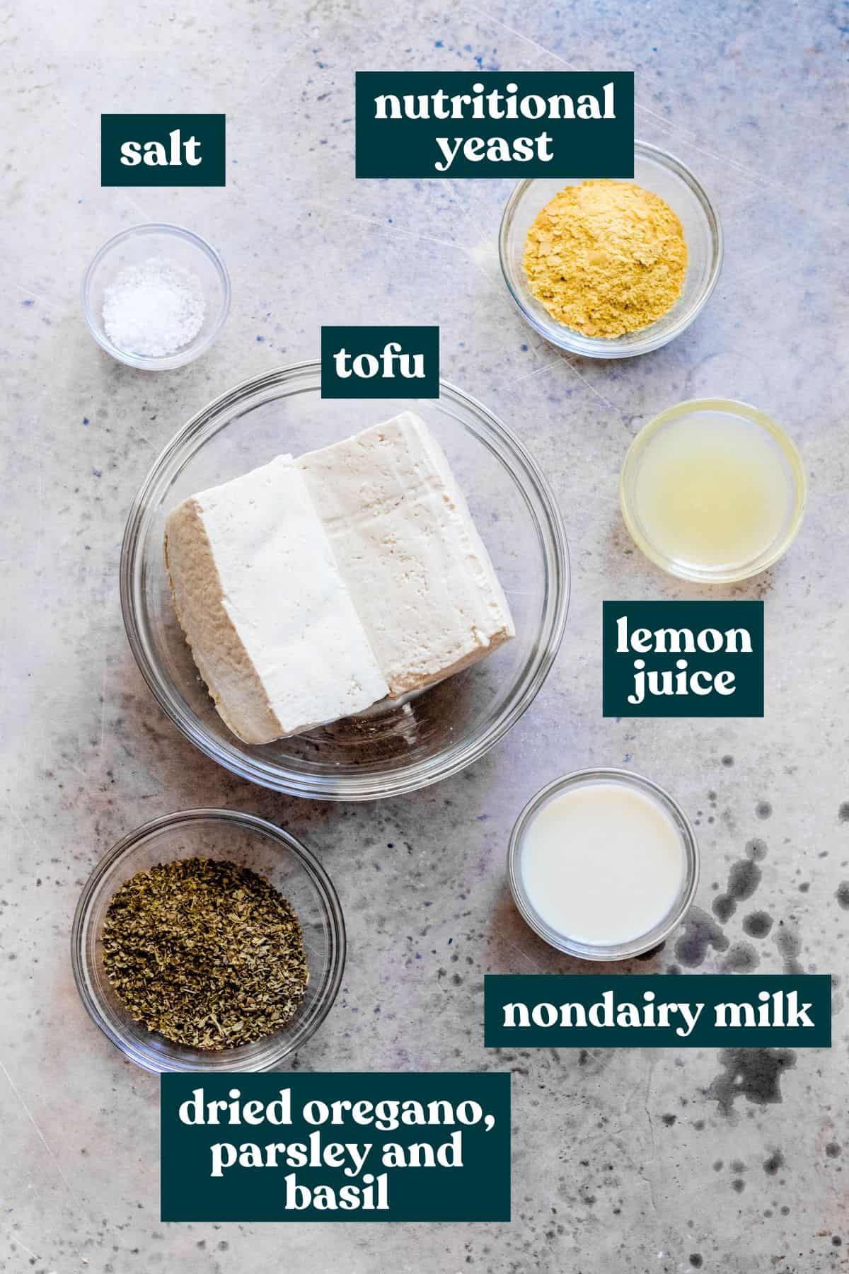 Tofu, nutritional yeast, spices, milk, lemon juice and salt. 