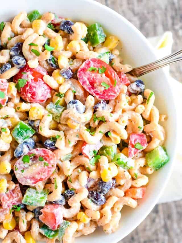 Pasta salad with spoon.