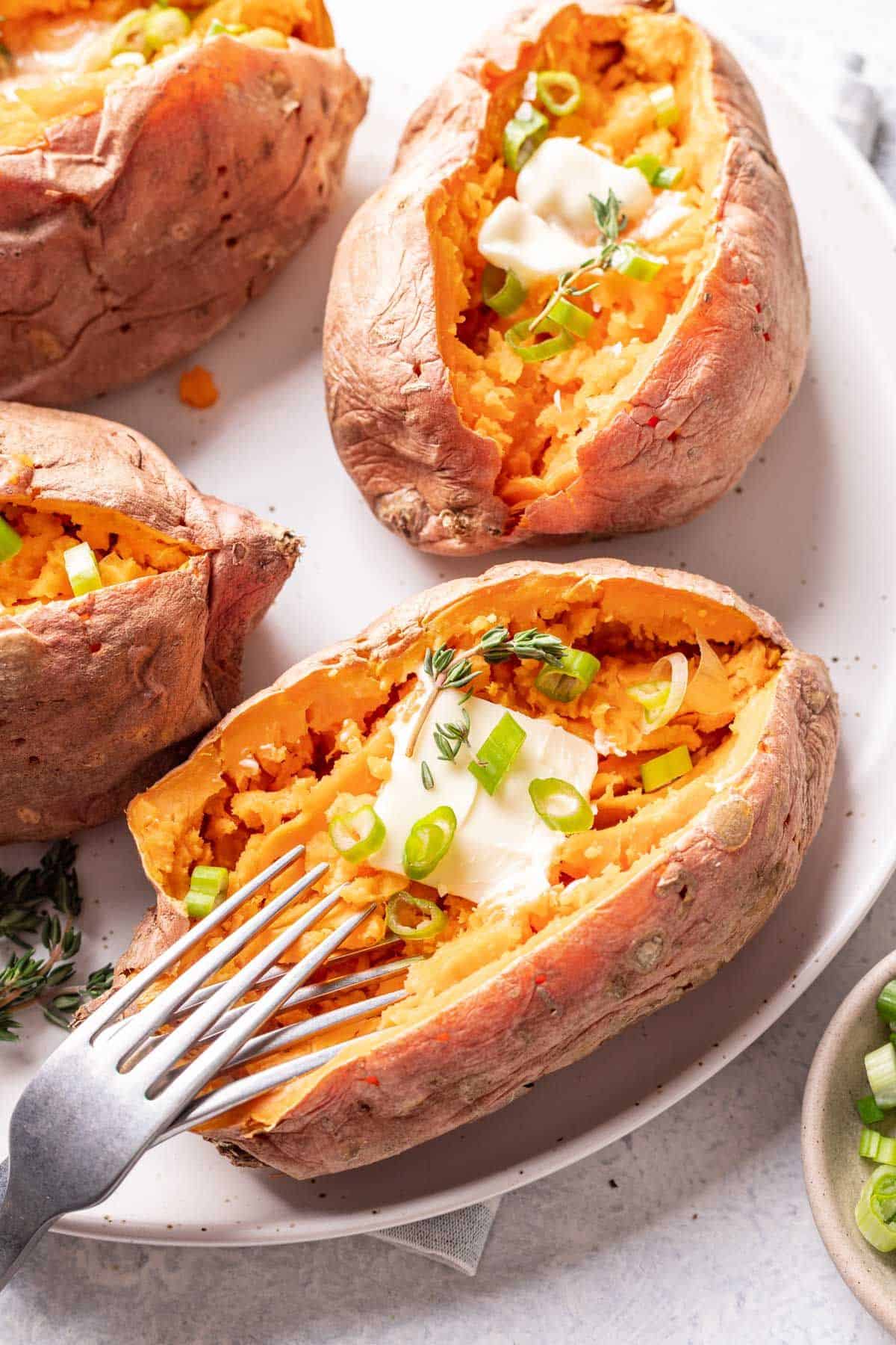 Sweet potatoes with butter and green onion.