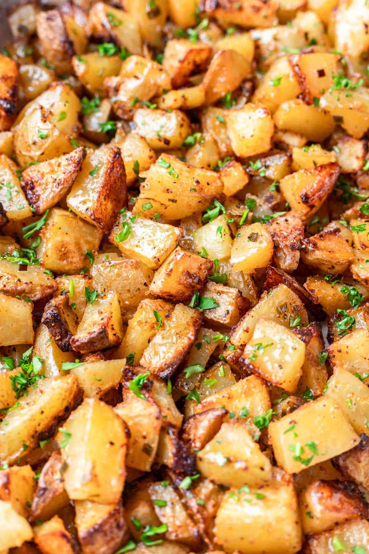 Closeup of roasted oven potatoes.