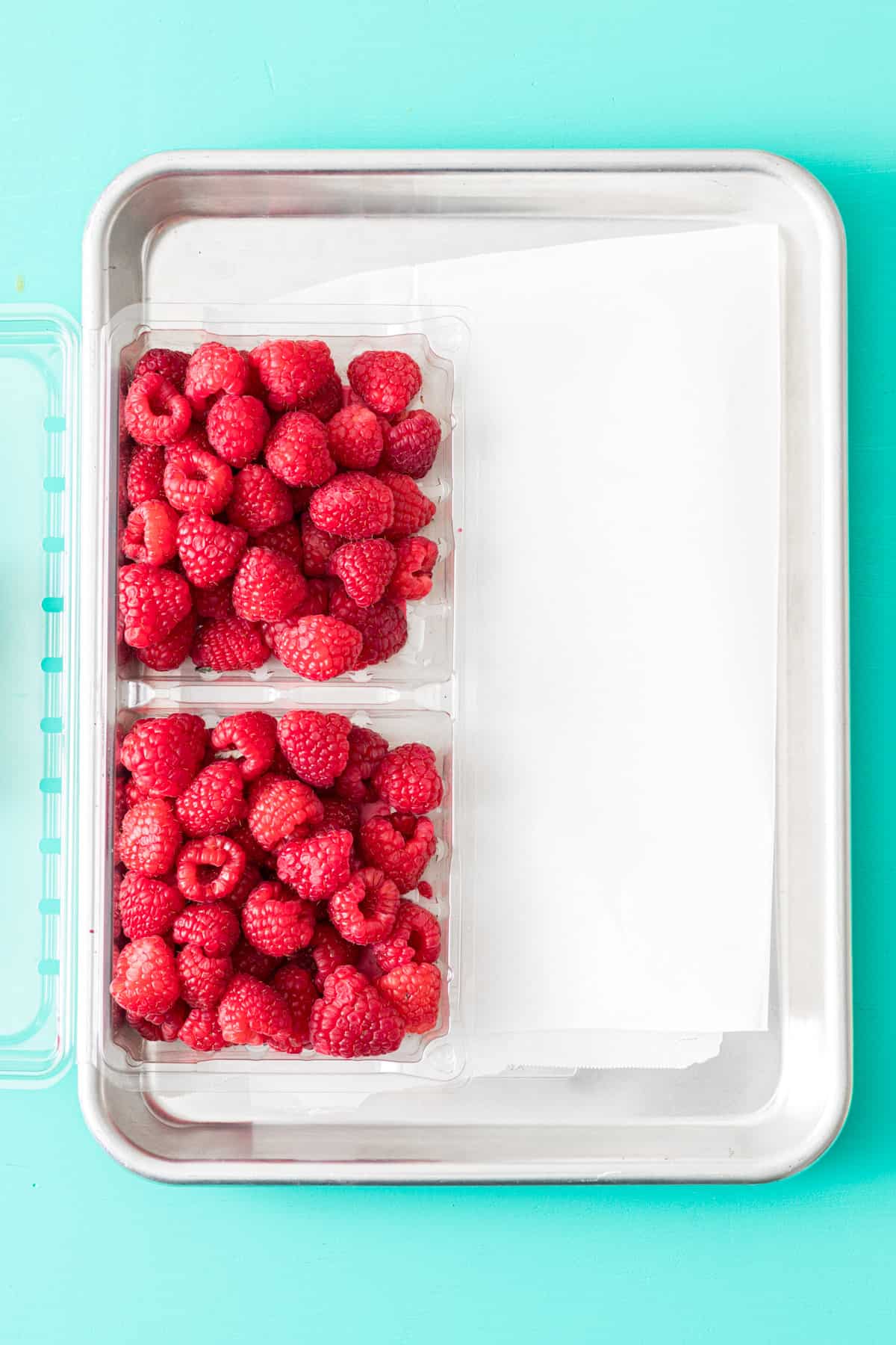 Berries, parchment paper, and baking sheet.