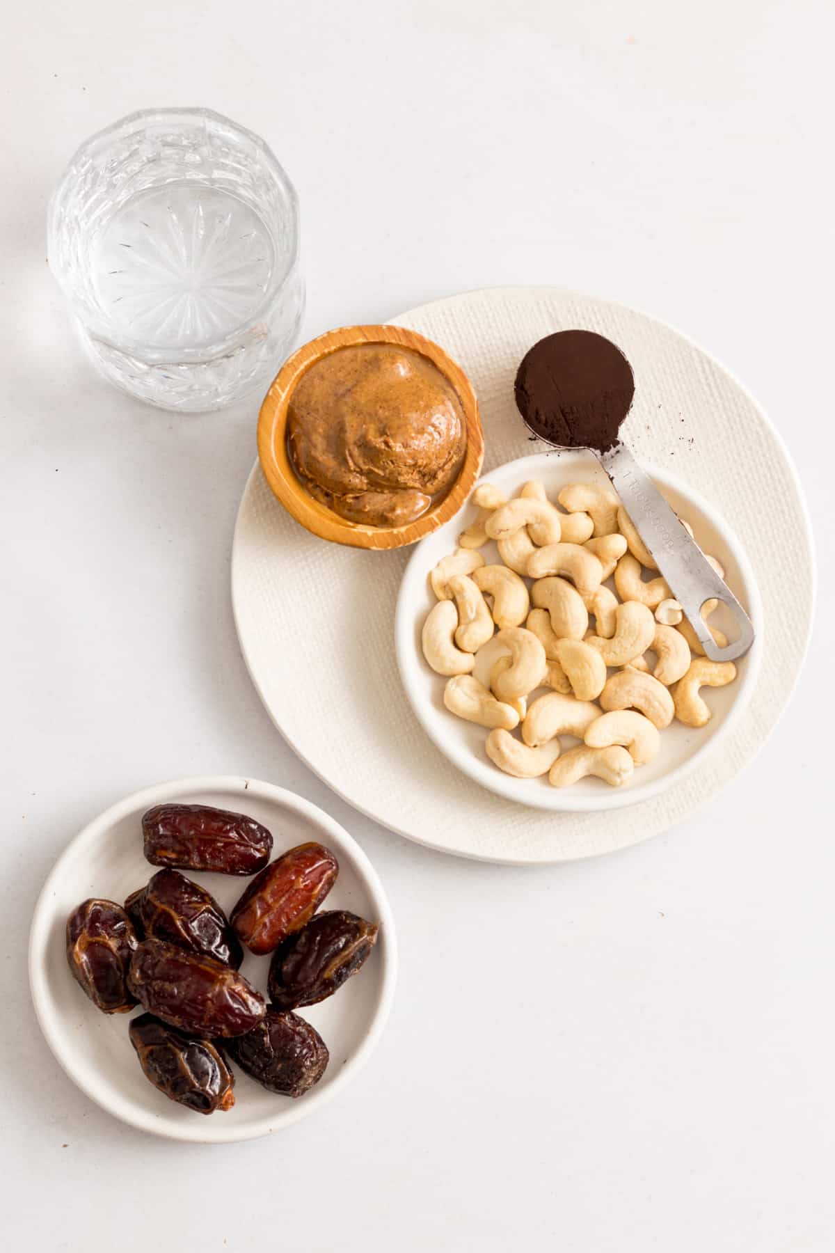 Cashews, cocoa, almond butter, water, and dates.
