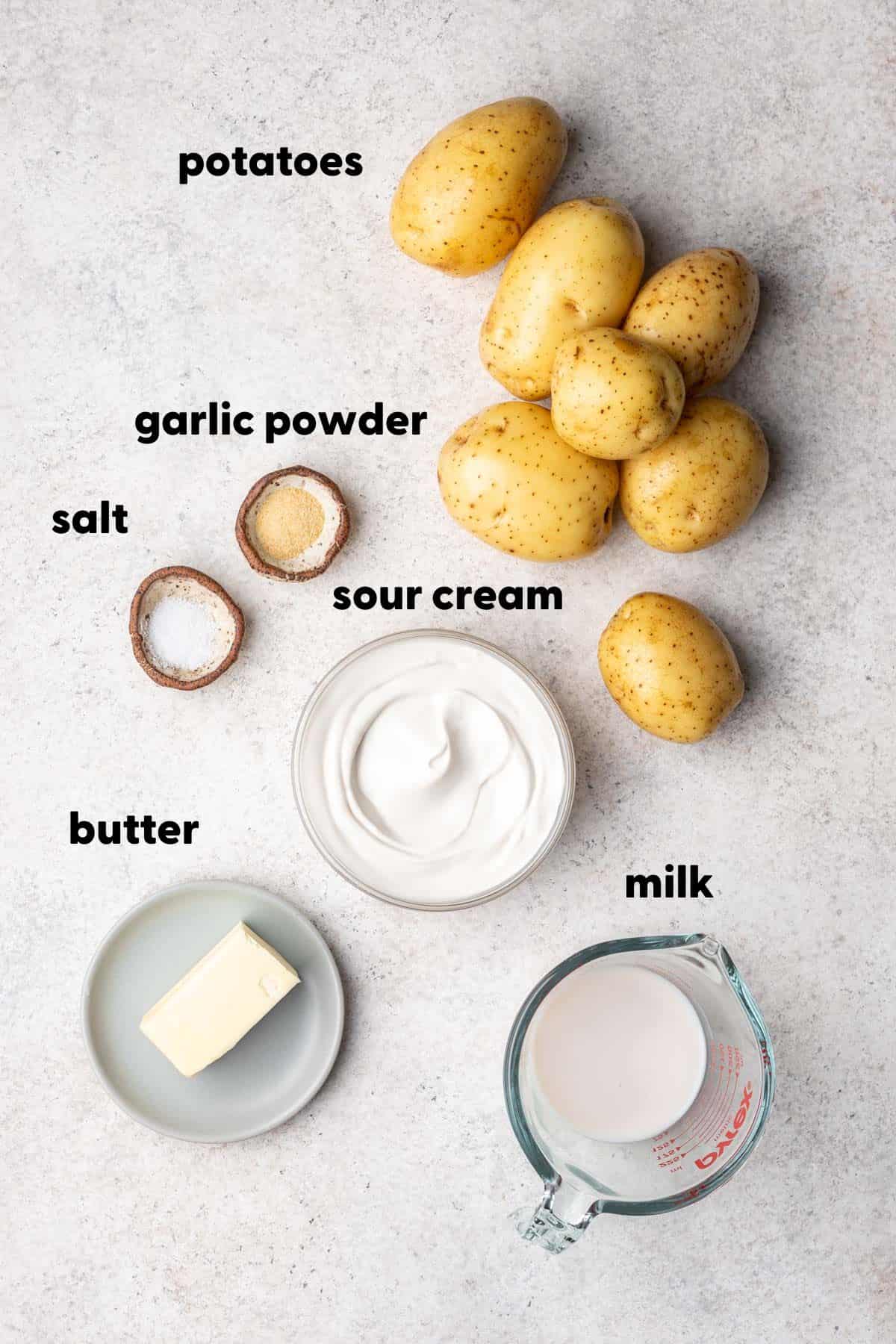 Ingredients you'll need for mashed potatoes measured and labeled.