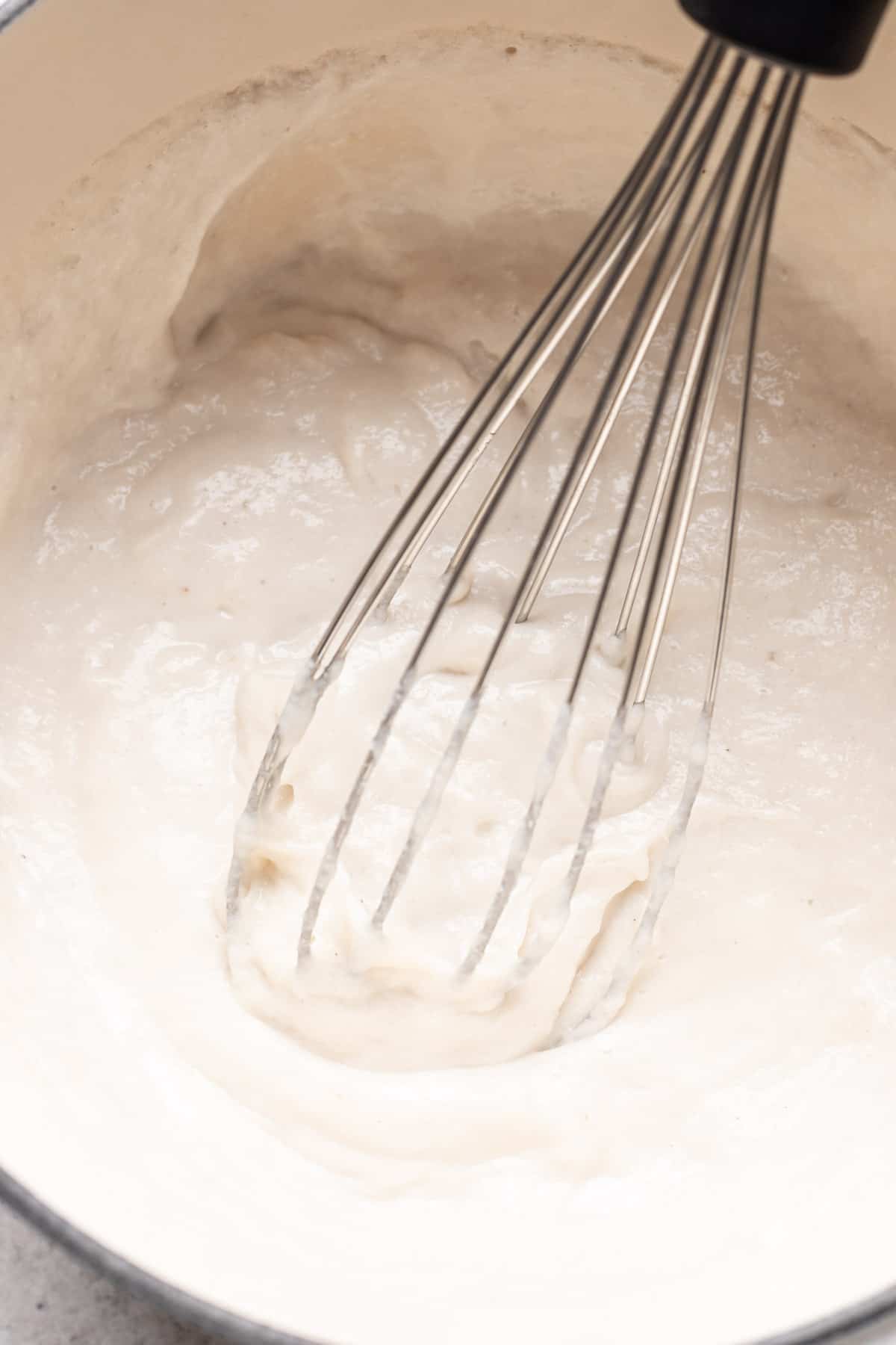 Cheese whisked until thick and stretchy.