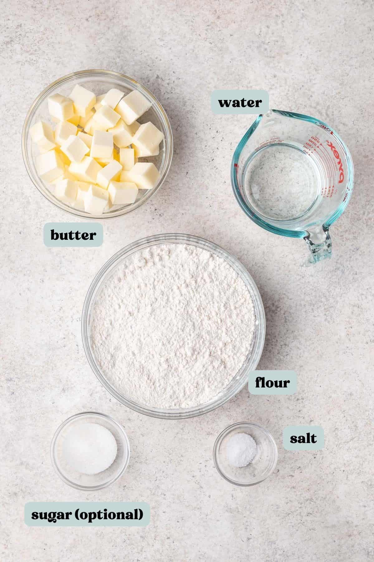 Ingredients you need measured and labeled for homemade pie crust.