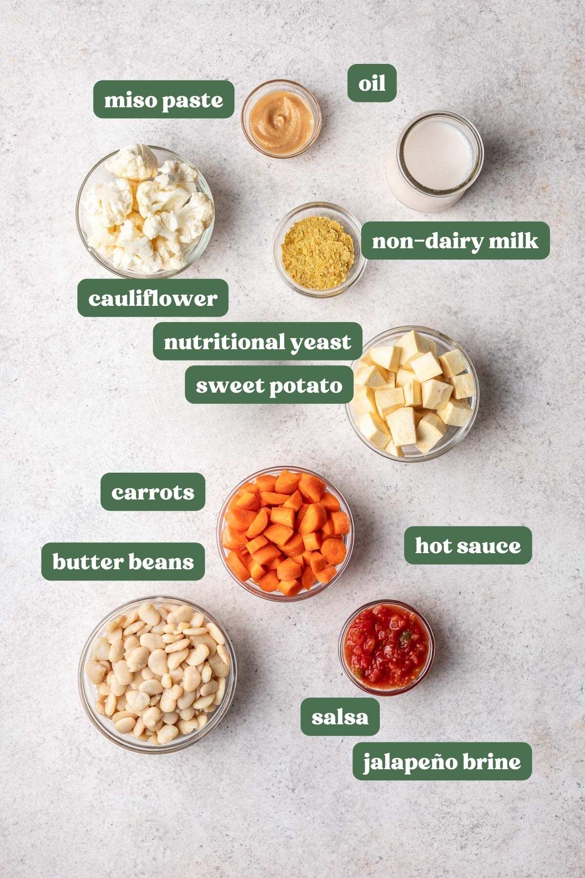 Ingredients labeled and measured to make vegan nacho cheese without cashews.