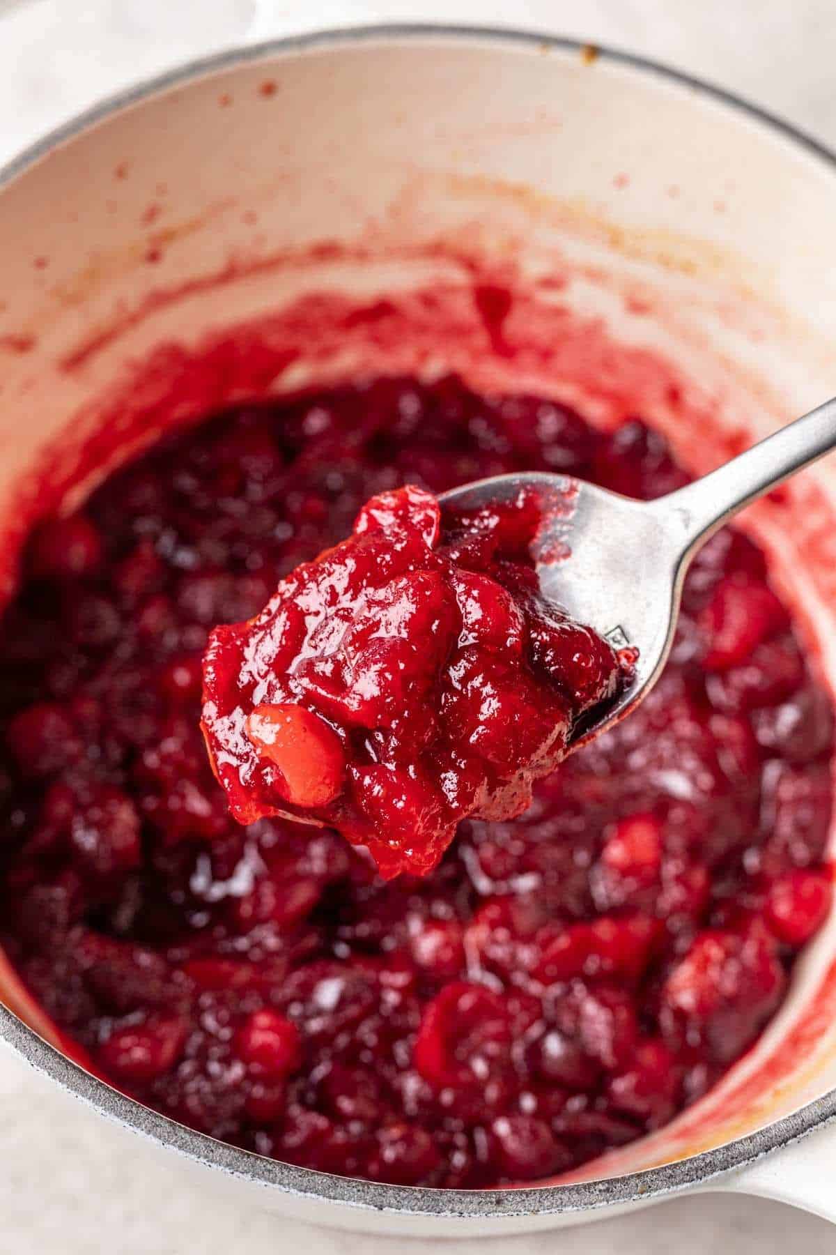 Texture of cranberry sauce after 10-15 minutes of cooking.