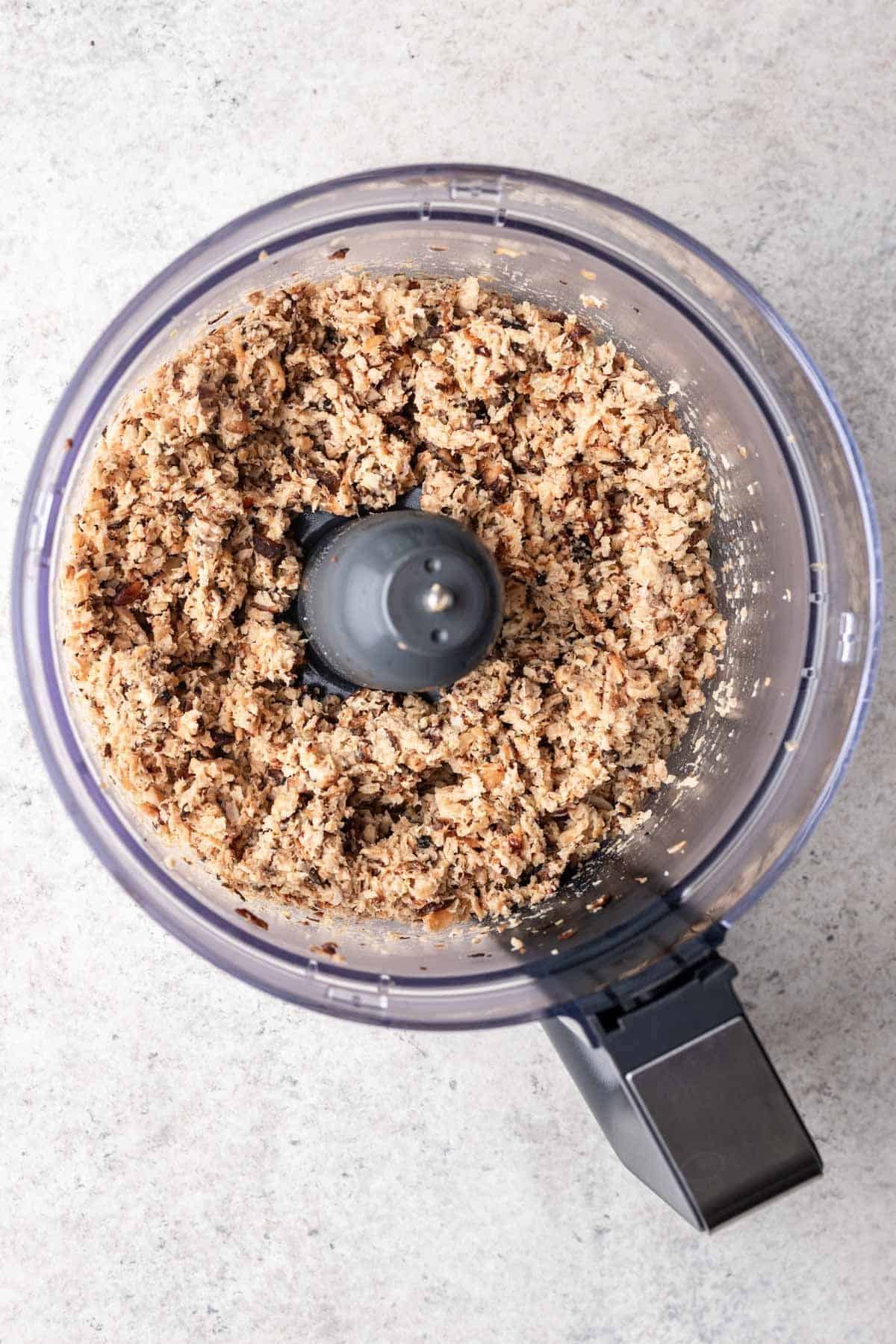 Ground beef ingredients pulsed together in a food processor.